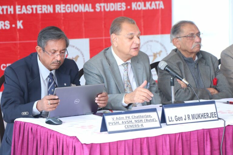 V Adm P K Chatterjee and Lt Gen J R Mukherjee among three panellists at the CENERS-K table, one of them reading from a laptop, the red centre banner behind.